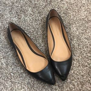 Black pointed toe flats